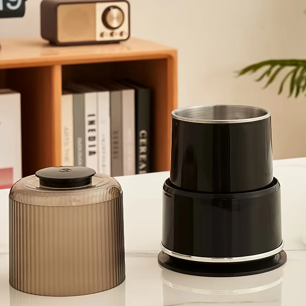 Household electric grinder with stainless steel blade, multi-functional grinder for coffee, spices, and nuts.