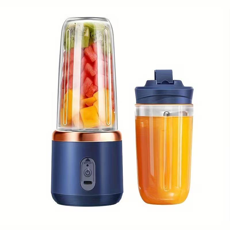 Portable Juicer That Can Be Charged Via USB, Comes with Two Cups, Features a Sport Cup Lid, And Is Multifunctional. It Has a Design And a Six-Blade System for Quick Juicing, Producing Smooth Juice, Making It Ideal for Home, Kitchen, And Travel Use