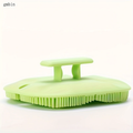 Skin massage brush. Features a handle for easy grip, and soft silicone bristles that are gentle on the skin. Practical for daily home care, easy to clean and maintain. A massage and cleaning brush.
