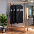 Black non-woven garment storage and dust cover; hanging suit organizer bag with a clear viewing window; easy-to-maintain, moisture-proof, and dust-proof storage bag for formal wear and suits.