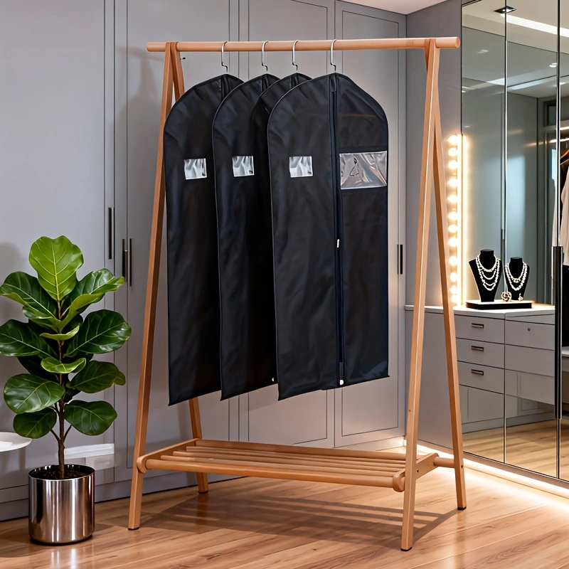 Black non-woven garment storage and dust cover; hanging suit organizer bag with a clear viewing window; easy-to-maintain, moisture-proof, and dust-proof storage bag for formal wear and suits.