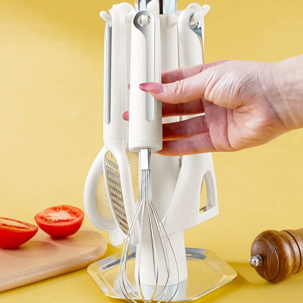 6pcs Multi-piece kitchen tool set, including a strainer, peelers (both vertical and horizontal), grater, bottle opener, and egg beater.