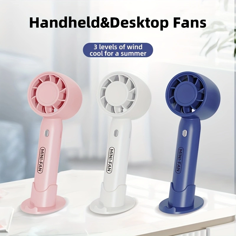 New mini handheld fan, USB rechargeable, comes with a stand for holding your phone.