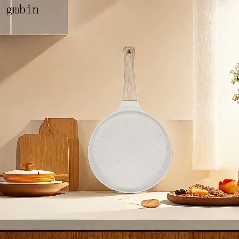 Non-stick crepe frying pan, suitable for crepes, tortillas, and risotto - induction cooker compatible. Features a non-stick coating on the bottom for even heat distribution and easy cleaning.
