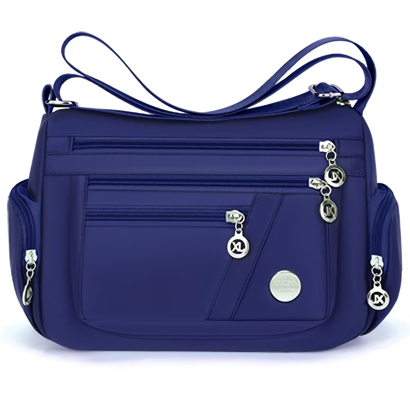Unisex Casual Crossbody Bag - a Spacious Multi-Pocket Shoulder Bag with Adjustable Straps, Made from Lightweight And Durable Lining. The Black Version Features Tassel Details