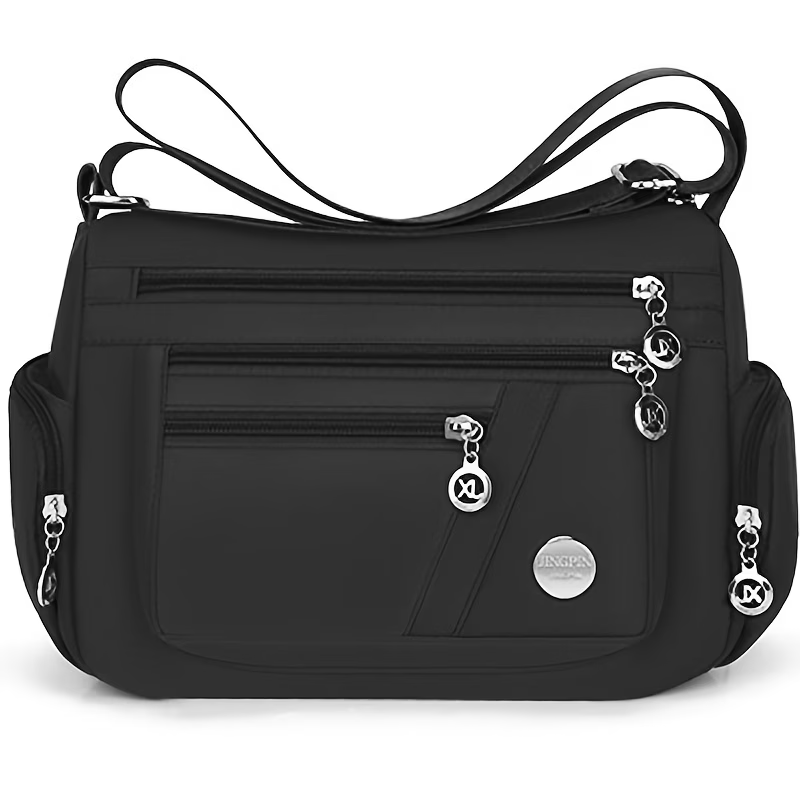 Unisex Casual Crossbody Bag - a Spacious Multi-Pocket Shoulder Bag with Adjustable Straps, Made from Lightweight And Durable Lining. The Black Version Features Tassel Details