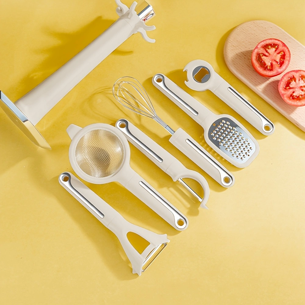 6pcs Multi-piece kitchen tool set, including a strainer, peelers (both vertical and horizontal), grater, bottle opener, and egg beater.