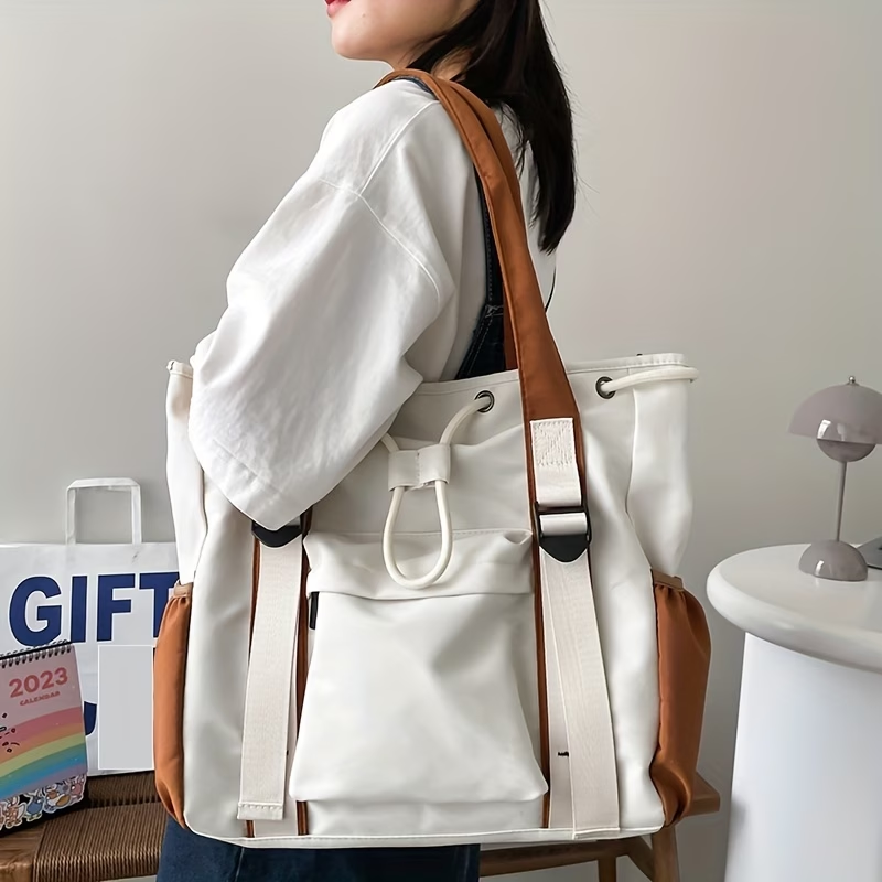A Large Capacity Two-Tone Tote Bag, And Suitable for Commuting, Made of Nylon, Designed for Women As a Casual Crossbody Bag for Students, Travel, And Shopping.