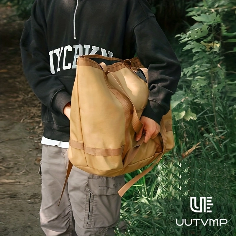 This outdoor khaki tote bag features multiple compartments and can be worn on the shoulder, by the hand, or crossbody for various occasions, including camping, hiking, outdoor commuting, and everyday outings.