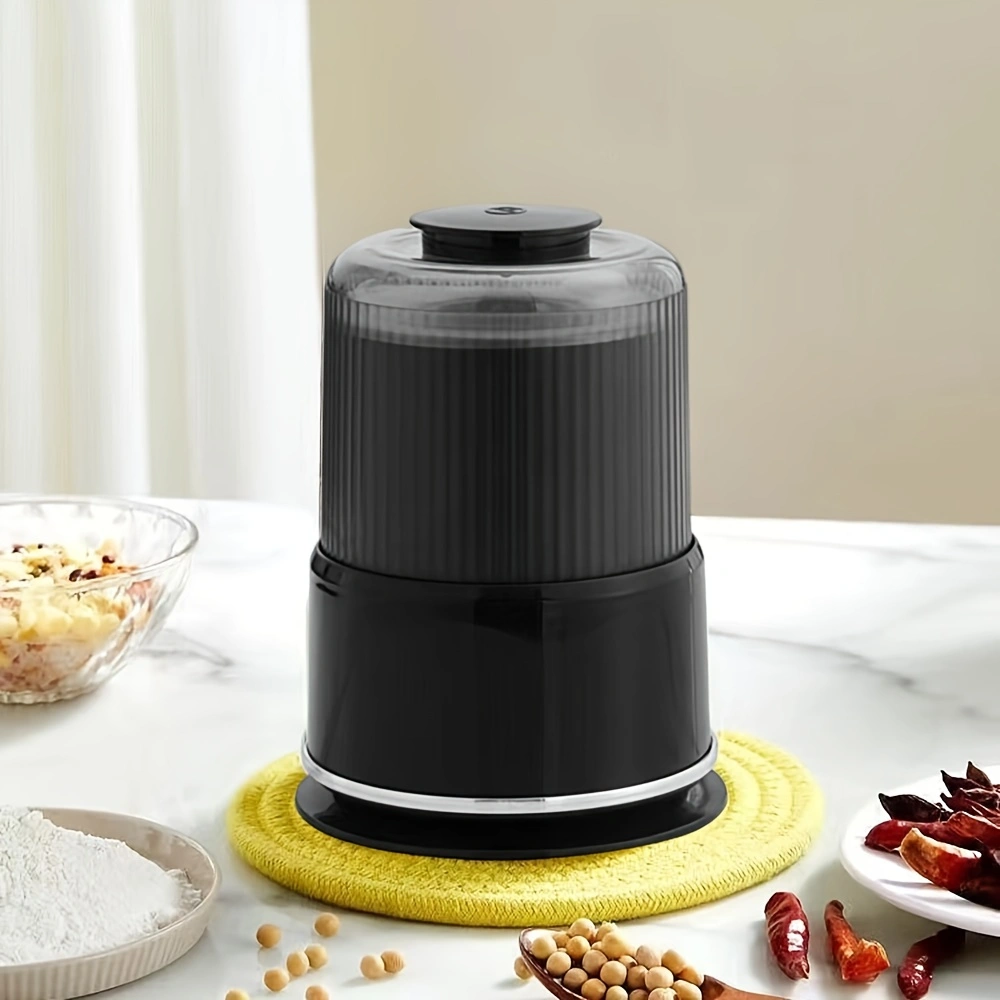 Household electric grinder with stainless steel blade, multi-functional grinder for coffee, spices, and nuts.