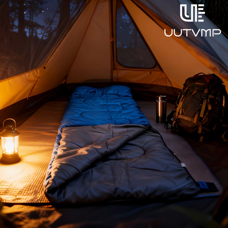 A blue envelope sleeping bag, modular and suitable for camping, hiking, trekking, cycling, travel, and other outdoor activities.