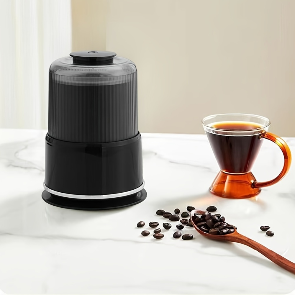 Household electric grinder with stainless steel blade, multi-functional grinder for coffee, spices, and nuts.