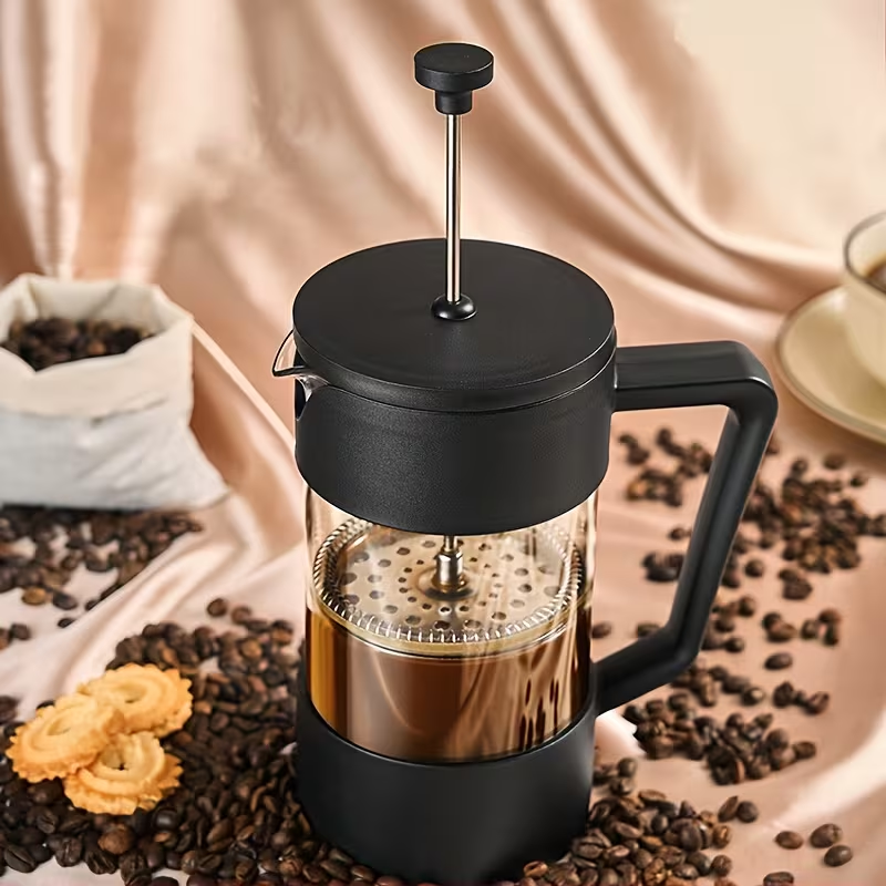This French press coffee maker features a high borosilicate heat-resistant glass body with a 304 stainless steel filter. It's suitable for brewing tea and coffee, frothing milk, and is ideal for home use or group outdoor trips.