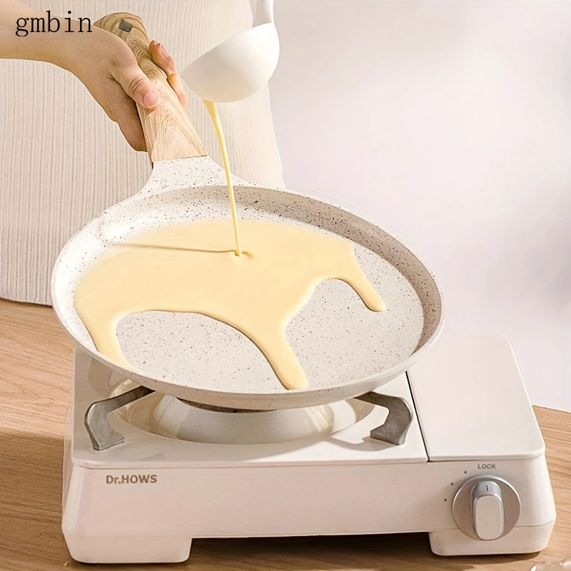 Non-stick crepe frying pan, suitable for crepes, tortillas, and risotto - induction cooker compatible. Features a non-stick coating on the bottom for even heat distribution and easy cleaning.