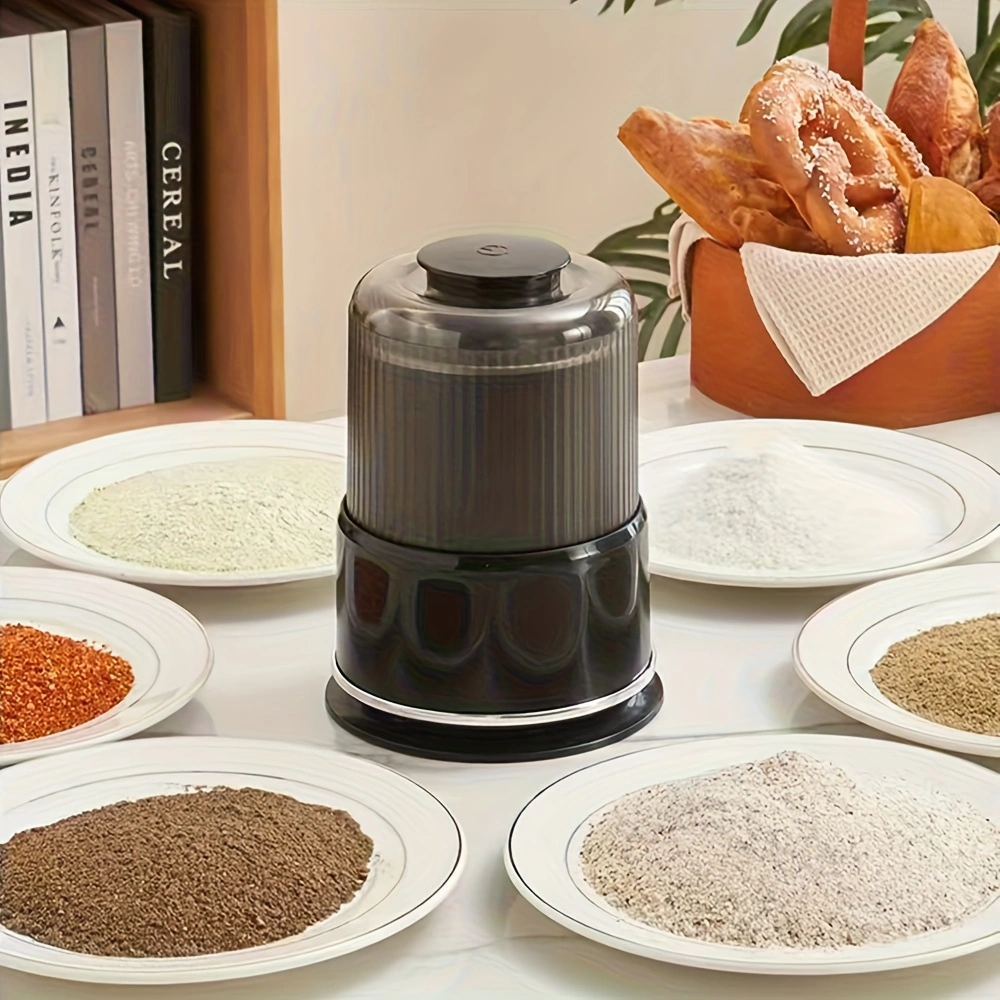 Household electric grinder with stainless steel blade, multi-functional grinder for coffee, spices, and nuts.