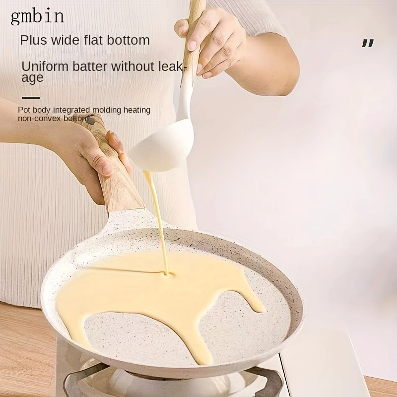 Non-stick crepe frying pan, suitable for crepes, tortillas, and risotto - induction cooker compatible. Features a non-stick coating on the bottom for even heat distribution and easy cleaning.