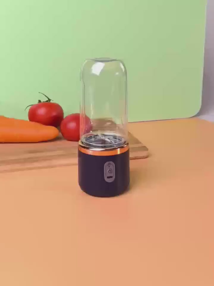 Portable Juicer That Can Be Charged Via USB, Comes with Two Cups, Features a Sport Cup Lid, And Is Multifunctional. It Has a Design And a Six-Blade System for Quick Juicing, Producing Smooth Juice, Making It Ideal for Home, Kitchen, And Travel Use